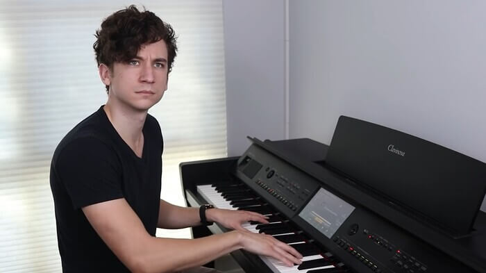 youtuber daniel thrasher is playing the piano